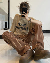 Braune Jeans der Fashion Week